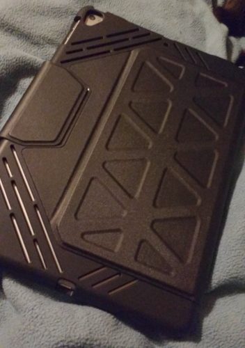 The back with slits to ensure the sound plays well. You can also the nice latch that keeps it closed.